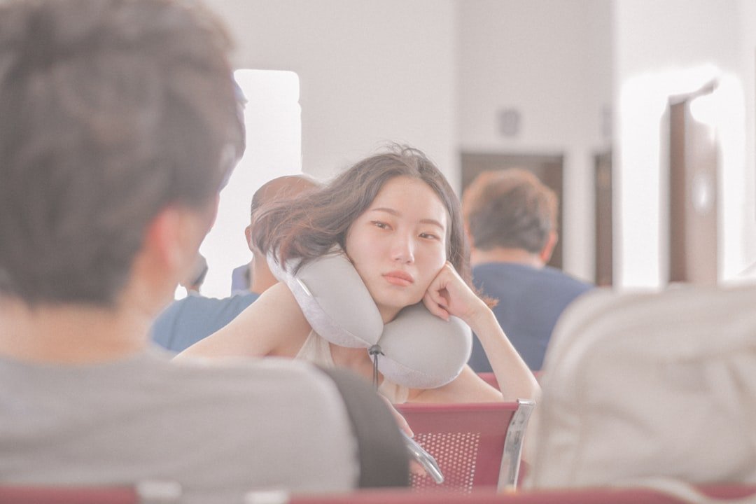 Travel neck pillow, eye mask, and light blanket compared together
