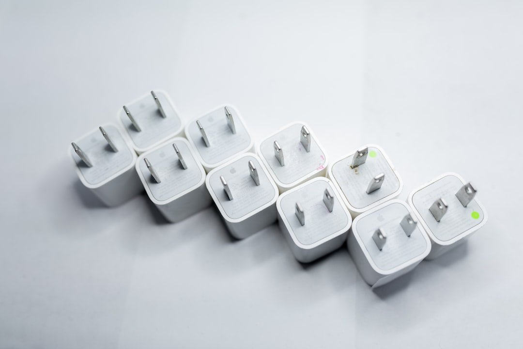 International travel plug adapter checked against device labels