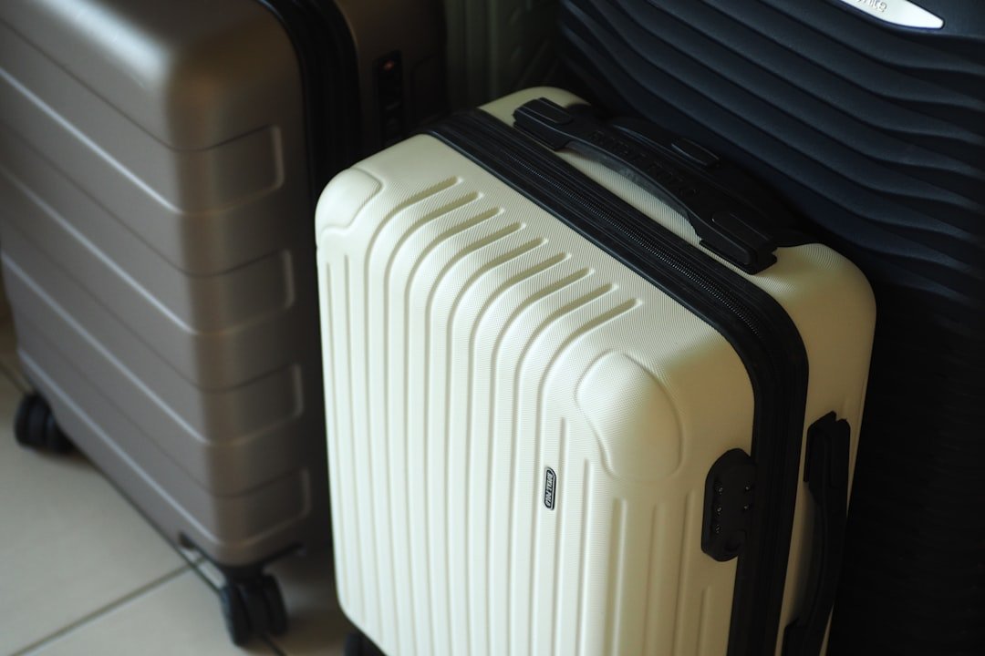 Hard-shell and soft-sided suitcases prepared for comparison